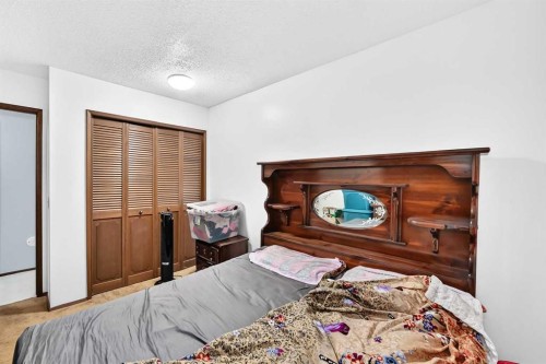 11 Rundlemere Place Ne, Calgary, AB - Indoor Photo Showing Bedroom