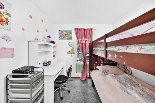 11 Rundlemere Place Ne, Calgary, AB - Indoor Photo Showing Bedroom