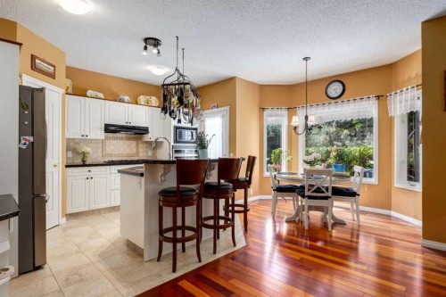 142 Springbank Crescent Sw, Calgary, AB - Indoor Photo Showing Kitchen With Upgraded Kitchen