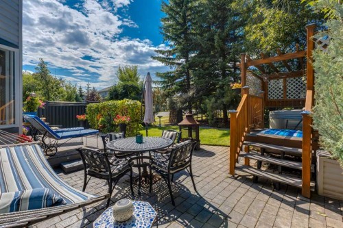 142 Springbank Crescent Sw, Calgary, AB - Outdoor With Deck Patio Veranda