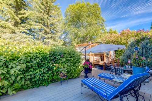 142 Springbank Crescent Sw, Calgary, AB - Outdoor With Deck Patio Veranda