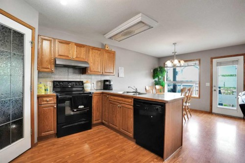 49 Saddletree Close Ne, Calgary, AB - Indoor Photo Showing Kitchen