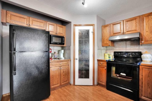 49 Saddletree Close Ne, Calgary, AB - Indoor Photo Showing Kitchen