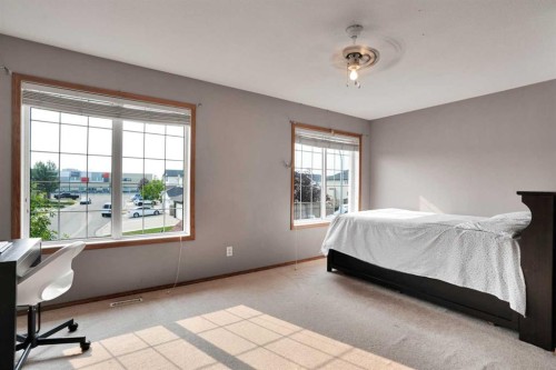 49 Saddletree Close Ne, Calgary, AB - Indoor Photo Showing Bedroom