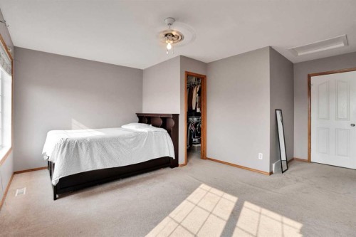 49 Saddletree Close Ne, Calgary, AB - Indoor Photo Showing Bedroom
