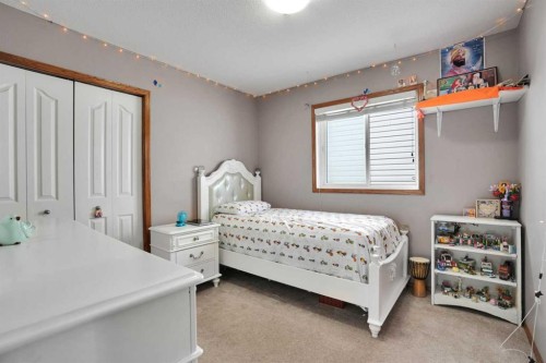 49 Saddletree Close Ne, Calgary, AB - Indoor Photo Showing Bedroom