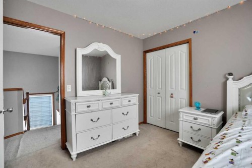 49 Saddletree Close Ne, Calgary, AB - Indoor Photo Showing Bedroom