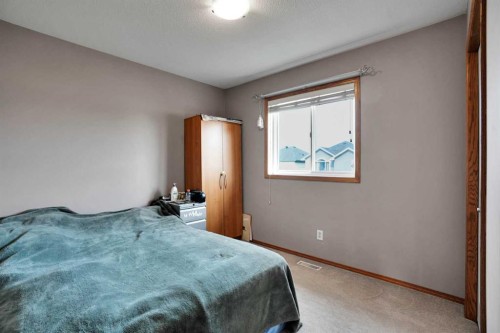 49 Saddletree Close Ne, Calgary, AB - Indoor Photo Showing Bedroom