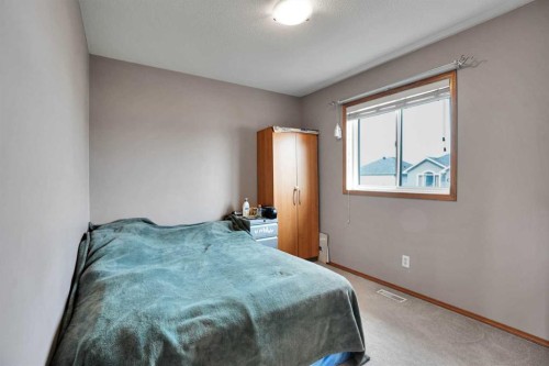 49 Saddletree Close Ne, Calgary, AB - Indoor Photo Showing Bedroom
