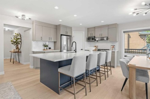 10 Aspen Stone Mews Sw, Calgary, AB - Indoor Photo Showing Kitchen With Stainless Steel Kitchen With Upgraded Kitchen