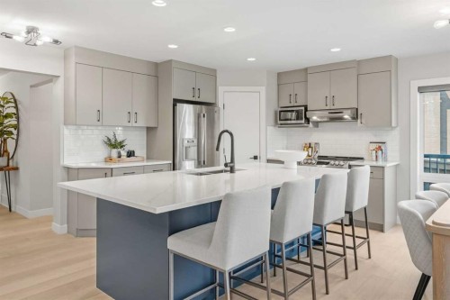 10 Aspen Stone Mews Sw, Calgary, AB - Indoor Photo Showing Kitchen With Stainless Steel Kitchen With Upgraded Kitchen