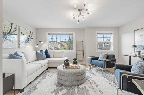 10 Aspen Stone Mews Sw, Calgary, AB - Indoor Photo Showing Living Room