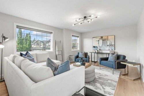 10 Aspen Stone Mews Sw, Calgary, AB - Indoor Photo Showing Living Room