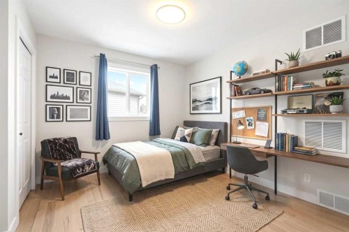 10 Aspen Stone Mews Sw, Calgary, AB - Indoor Photo Showing Bedroom