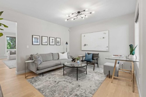 10 Aspen Stone Mews Sw, Calgary, AB - Indoor Photo Showing Living Room