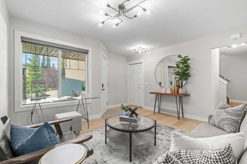 10 Aspen Stone Mews Sw, Calgary, AB - Indoor Photo Showing Living Room