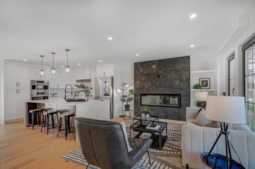 2543 Chicoutimi Drive Nw, Calgary, AB - Indoor With Fireplace