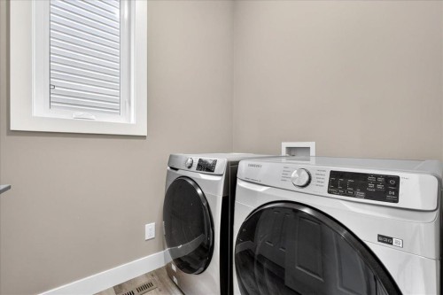 244 Carrington Crescent Nw, Calgary, AB - Indoor Photo Showing Laundry Room