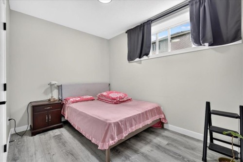 244 Carrington Crescent Nw, Calgary, AB - Indoor Photo Showing Bedroom