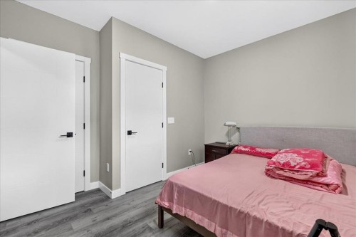 244 Carrington Crescent Nw, Calgary, AB - Indoor Photo Showing Bedroom