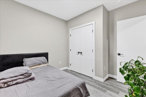 244 Carrington Crescent Nw, Calgary, AB - Indoor Photo Showing Bedroom