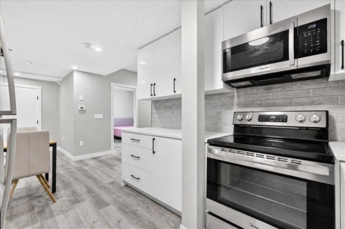 244 Carrington Crescent Nw, Calgary, AB - Indoor Photo Showing Kitchen With Upgraded Kitchen