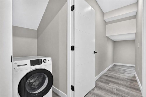 244 Carrington Crescent Nw, Calgary, AB - Indoor Photo Showing Laundry Room