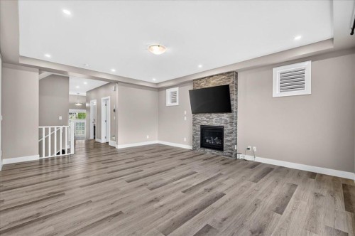 244 Carrington Crescent Nw, Calgary, AB - Indoor With Fireplace