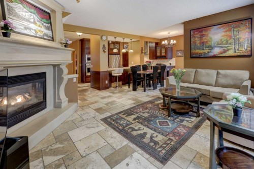 66 Copperfield Close Se, Calgary, AB - Indoor Photo Showing Living Room With Fireplace