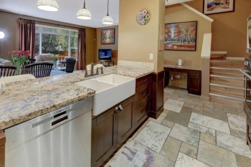 66 Copperfield Close Se, Calgary, AB - Indoor Photo Showing Kitchen With Double Sink