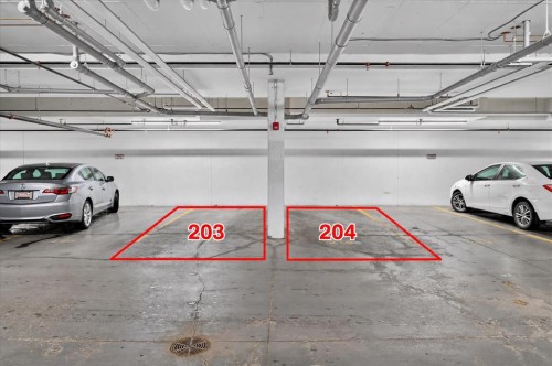 406-4350 Seton Drive Se, Calgary, AB - Indoor Photo Showing Garage