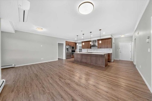 406-4350 Seton Drive Se, Calgary, AB - Indoor Photo Showing Kitchen