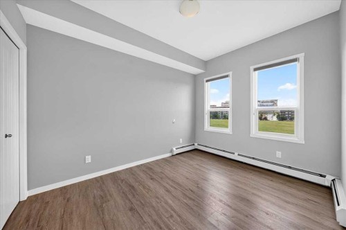 406-4350 Seton Drive Se, Calgary, AB - Indoor Photo Showing Other Room