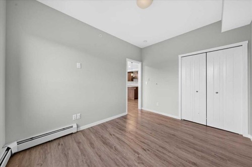 406-4350 Seton Drive Se, Calgary, AB - Indoor Photo Showing Other Room