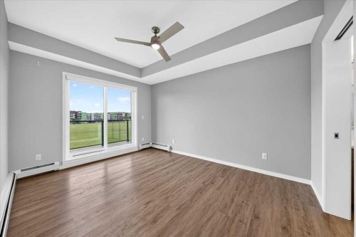 406-4350 Seton Drive Se, Calgary, AB - Indoor Photo Showing Other Room