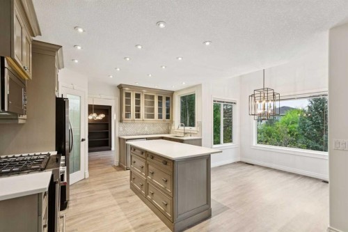 38 Tuscany Hills Crescent Nw, Calgary, AB - Indoor Photo Showing Kitchen With Upgraded Kitchen