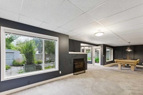 38 Tuscany Hills Crescent Nw, Calgary, AB - Indoor With Fireplace