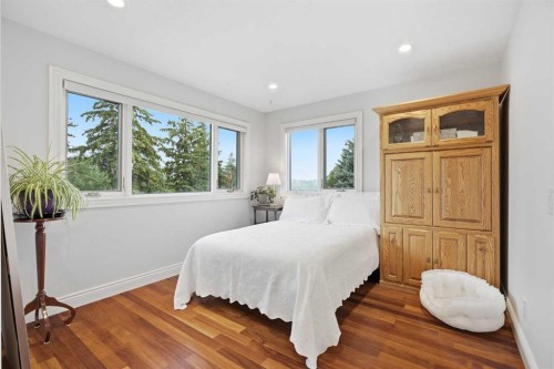 109 Shawnee Place Sw, Calgary, AB - Indoor Photo Showing Bedroom