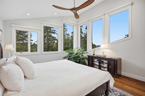 109 Shawnee Place Sw, Calgary, AB - Indoor Photo Showing Bedroom