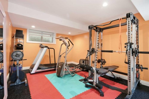 109 Shawnee Place Sw, Calgary, AB - Indoor Photo Showing Gym Room