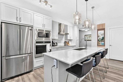 409-30 Walgrove Se, Calgary, AB - Indoor Photo Showing Kitchen With Stainless Steel Kitchen With Upgraded Kitchen