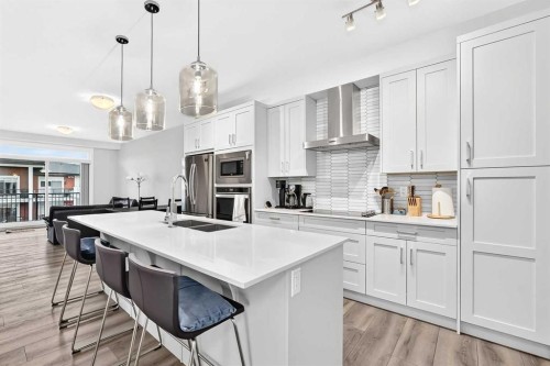 409-30 Walgrove Se, Calgary, AB - Indoor Photo Showing Kitchen With Double Sink With Upgraded Kitchen