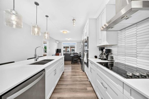 409-30 Walgrove Se, Calgary, AB - Indoor Photo Showing Kitchen With Double Sink With Upgraded Kitchen
