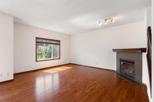 57 Everoak Circle Sw, Calgary, AB - Indoor With Fireplace