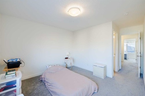 50 Sage Bluff Circle Nw, Calgary, AB - Indoor Photo Showing Bedroom