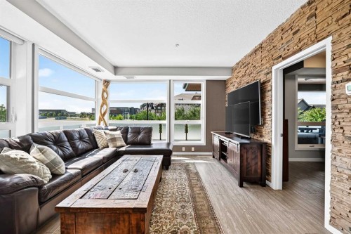 201-122 Mahogany Centre Se, Calgary, AB - Indoor Photo Showing Living Room