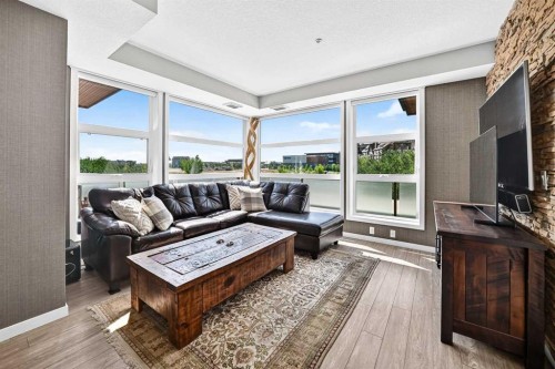 201-122 Mahogany Centre Se, Calgary, AB - Indoor Photo Showing Living Room