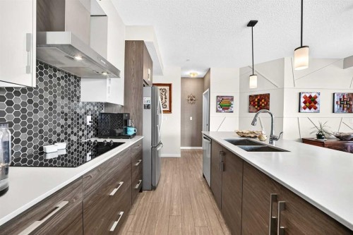 201-122 Mahogany Centre Se, Calgary, AB - Indoor Photo Showing Kitchen With Double Sink With Upgraded Kitchen