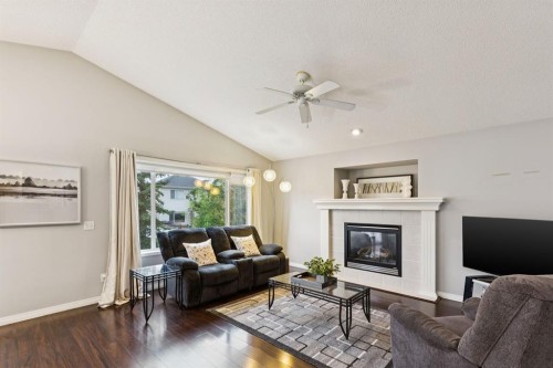 21 Covehaven Gardens Ne, Calgary, AB - Indoor Photo Showing Living Room With Fireplace