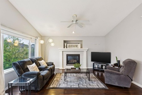 21 Covehaven Gardens Ne, Calgary, AB - Indoor Photo Showing Living Room With Fireplace